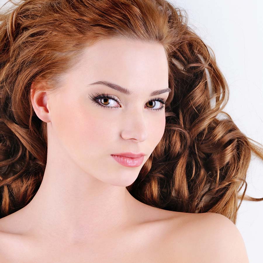 attractive young woman with curly hairs